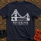 Bridging The Bars - T-Shirt in Navy - A black and white illustration of a suspension bridge where the vertical cables are...