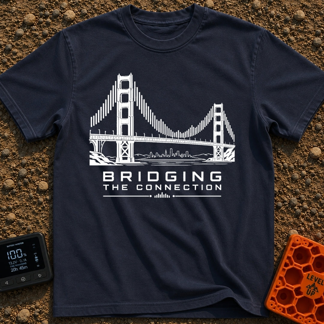 Bridging The Bars - T-Shirt in Navy - A black and white illustration of a suspension bridge where the vertical cables are...