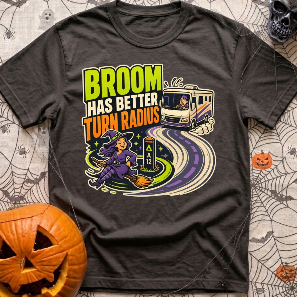 Brooms Turn Better - T-Shirt in Graphite - A cartoon illustration showing a witch flying effortlessly in a tight circle...