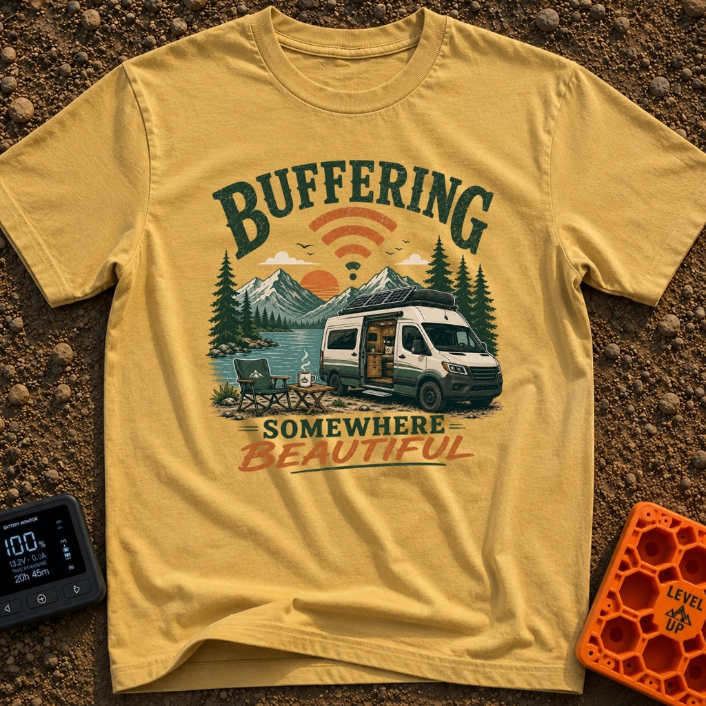 Buffering In The Wild - T-Shirt in Mustard - A camper van with roof-mounted solar panels is parked beside a mountain...