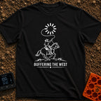 Buffering The West - T-Shirt in Black - A black and white illustration of a cowboy riding a galloping horse, swinging a...