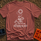 Buffering The West - T-Shirt in Brick - A black and white illustration of a cowboy riding a galloping horse, swinging a...