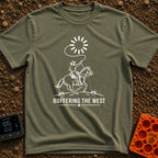Buffering The West - T-Shirt in Moss - A black and white illustration of a cowboy riding a galloping horse, swinging a...