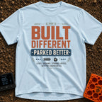 Built Different Parked - T-Shirt in Chambray - A typographic design reading 'BUILT DIFFERENT' and 'PARKED BETTER' in...