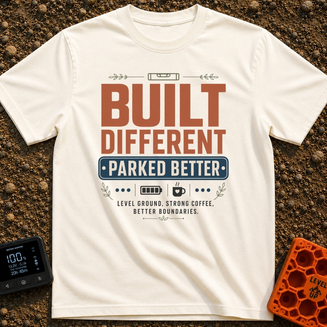 Built Different Parked - T-Shirt in Ivory - A typographic design reading 'BUILT DIFFERENT' and 'PARKED BETTER' in large...