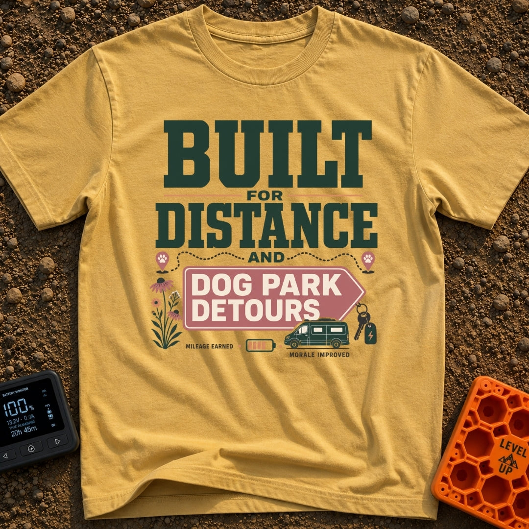 Dog Park Detours - T-Shirt in Mustard - A typographical design reading "Built For Distance And Dog Park Detours",...