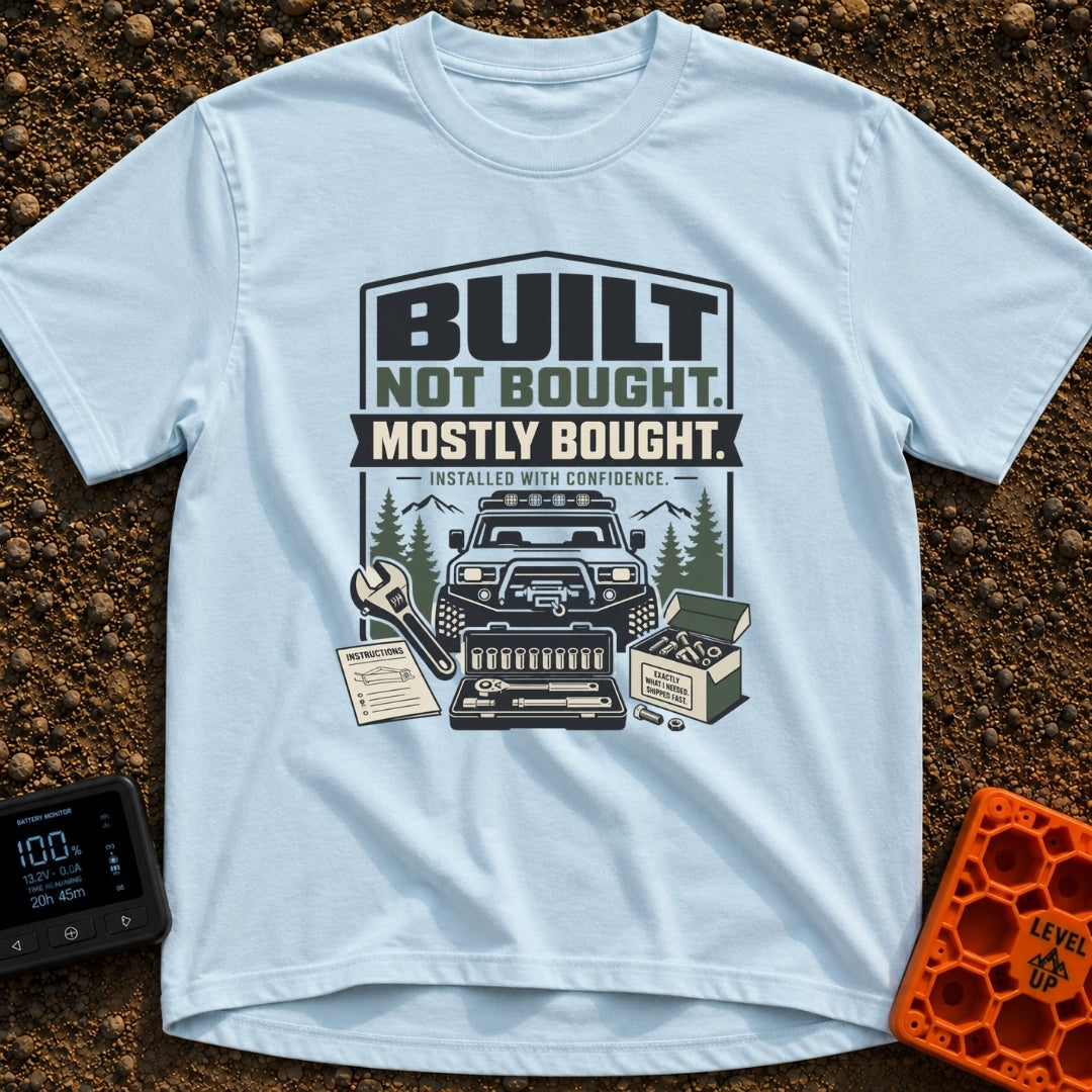 Built But Mostly Bought - T-Shirt in Chambray - A graphic illustration featuring an off-road 4x4 vehicle with a front...