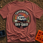 Wired And Unplugged - T-Shirt in Brick - A circular graphic featuring a camper van parked among pine trees with a...