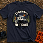 Wired And Unplugged - T-Shirt in Navy - A circular graphic featuring a camper van parked among pine trees with a deployed...