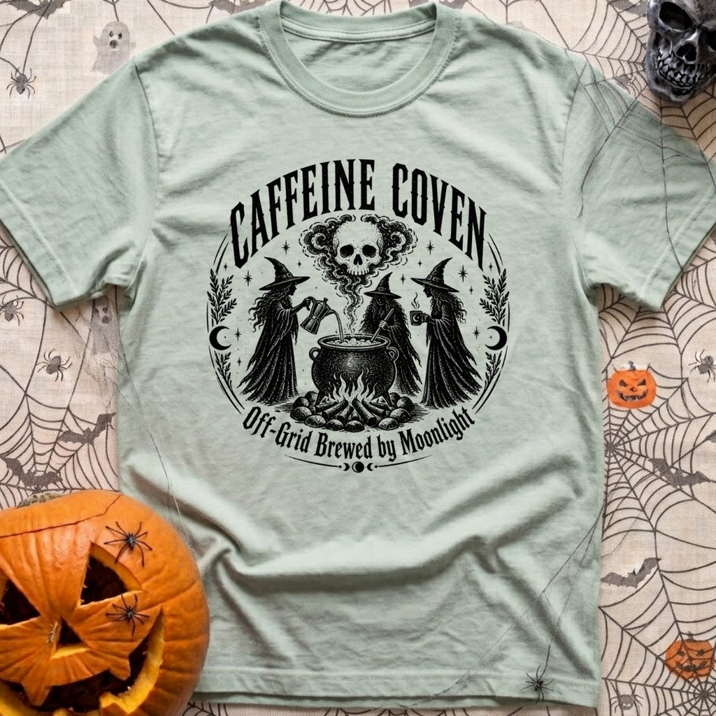 Wake The Coven - T-Shirt in Bay - A black and white circular illustration of three witches standing around a cauldron...