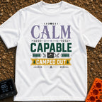 Calm Capable Camped Out - T-Shirt in White - A typographic design featuring the words "CALM CAPABLE CAMPED OUT" arranged...