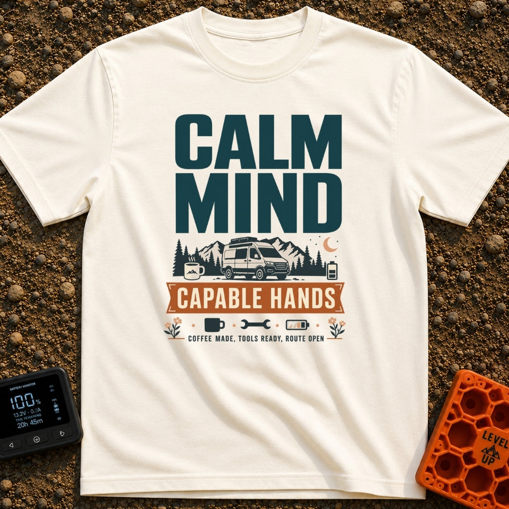 Calm And Capable - T-Shirt in Ivory - A typographic graphic reading "CALM MIND" above a camper van parked in front of...