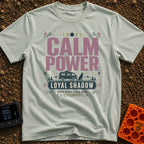 Powered By Loyal Shadows - T-Shirt in Bay - A camper van parked next to a silhouette of a sitting dog with mountains and...