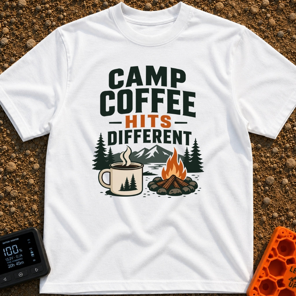 Brew Hits Different - T-Shirt in White - A graphic showing a steaming enamel camp mug next to a stone-ringed campfire,...