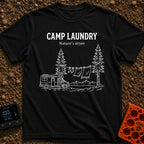 Solar Powered Dryer - T-Shirt in Black - White line art showing a camper van parked beside two pine trees with a...