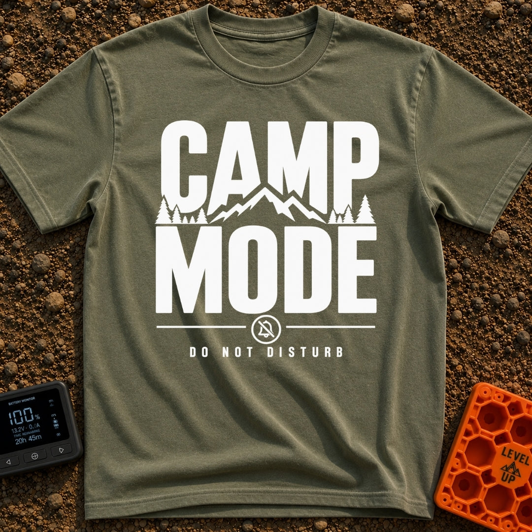 Camp Mode Activated - T-Shirt in Moss - Bold typographic design reading "CAMP MODE" with a silhouette of mountains and...