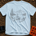 Paws-On Camp Setup - T-Shirt in Chambray - A black and white line illustration of a man setting up a folding camp chair...