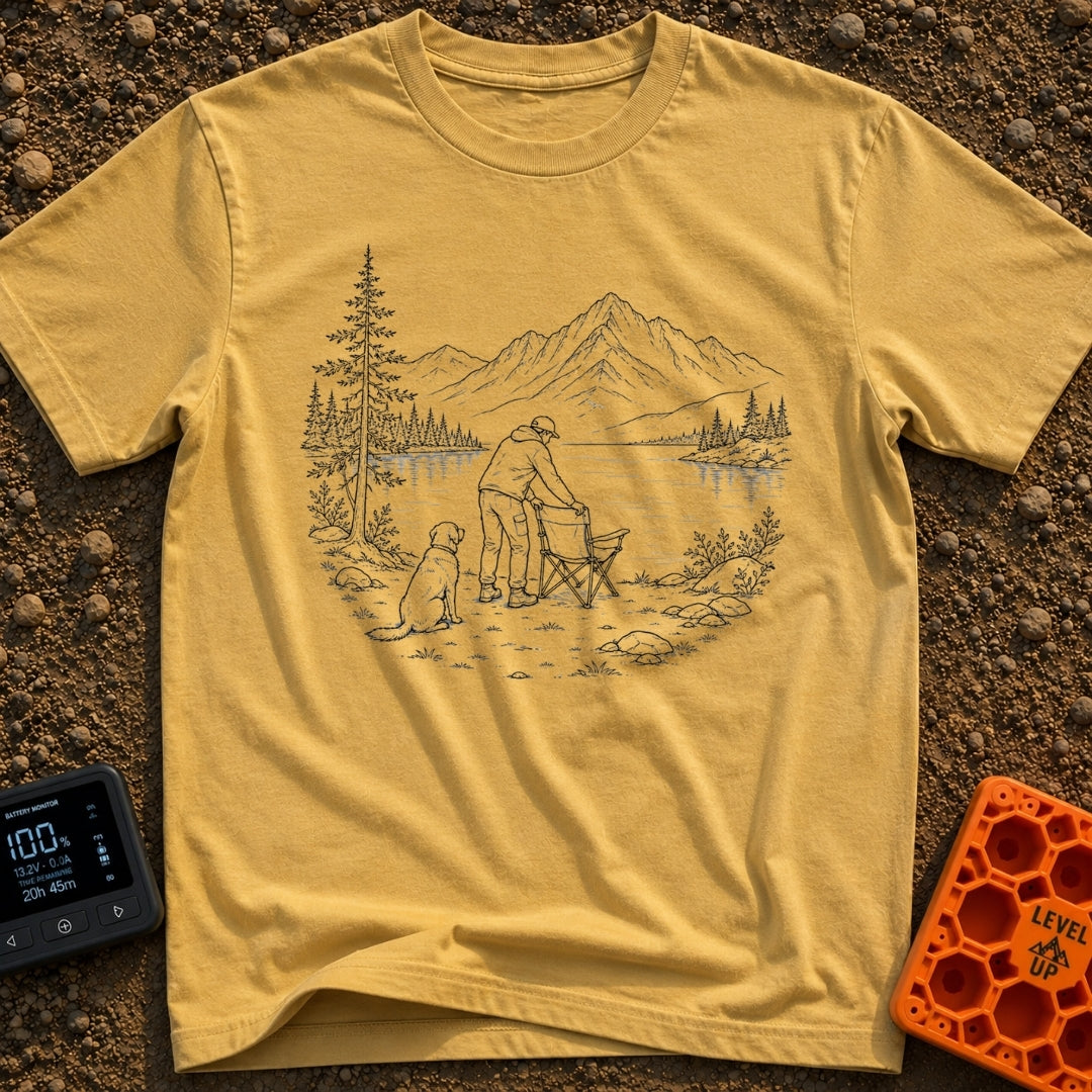 Paws-On Camp Setup - T-Shirt in Mustard - A black and white line illustration of a man setting up a folding camp chair on...