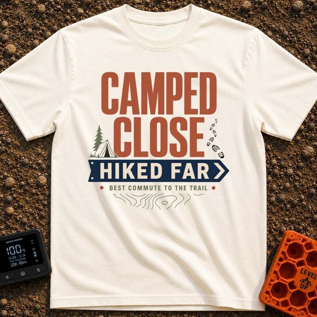 Best Commute Ever - T-Shirt in Ivory - Typographic design reading "CAMPED CLOSE" above a blue directional arrow sign...