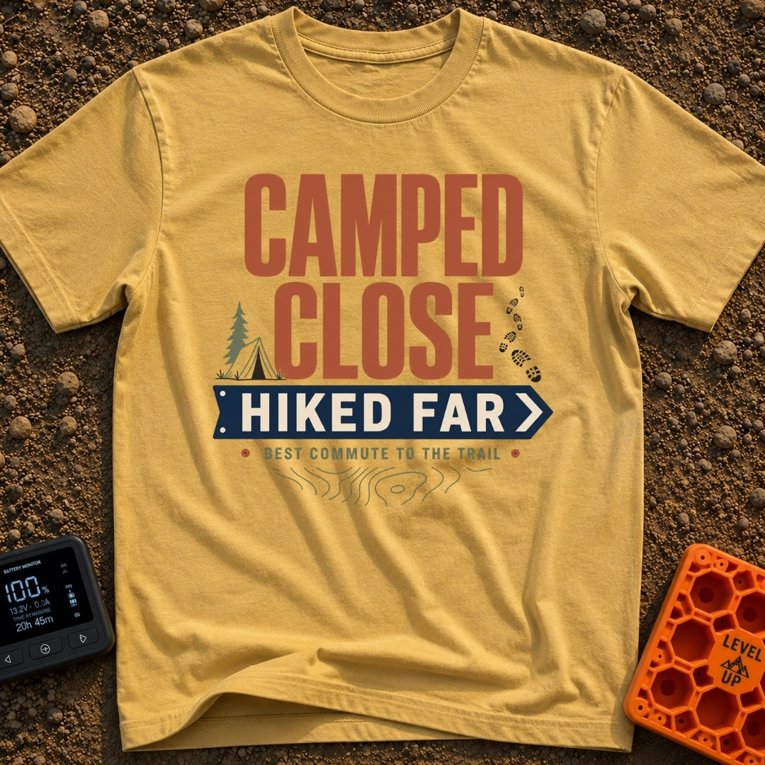 Best Commute Ever - T-Shirt in Mustard - Typographic design reading "CAMPED CLOSE" above a blue directional arrow sign...