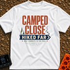 Best Commute Ever - T-Shirt in White - Typographic design reading "CAMPED CLOSE" above a blue directional arrow sign...