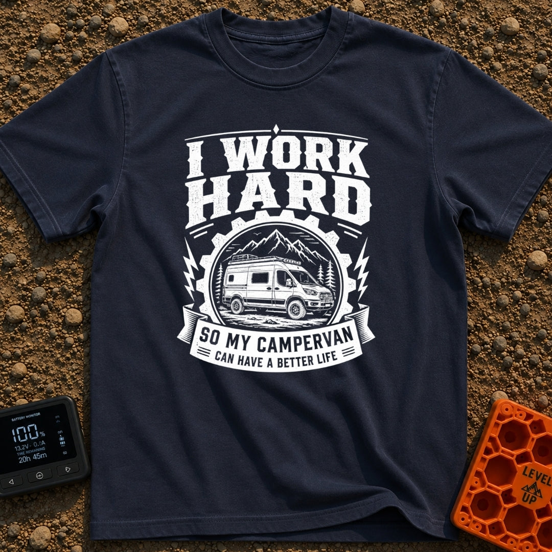 Primary Campervan Provider - T-Shirt in Navy - A black and white typographic design featuring a rugged campervan parked...