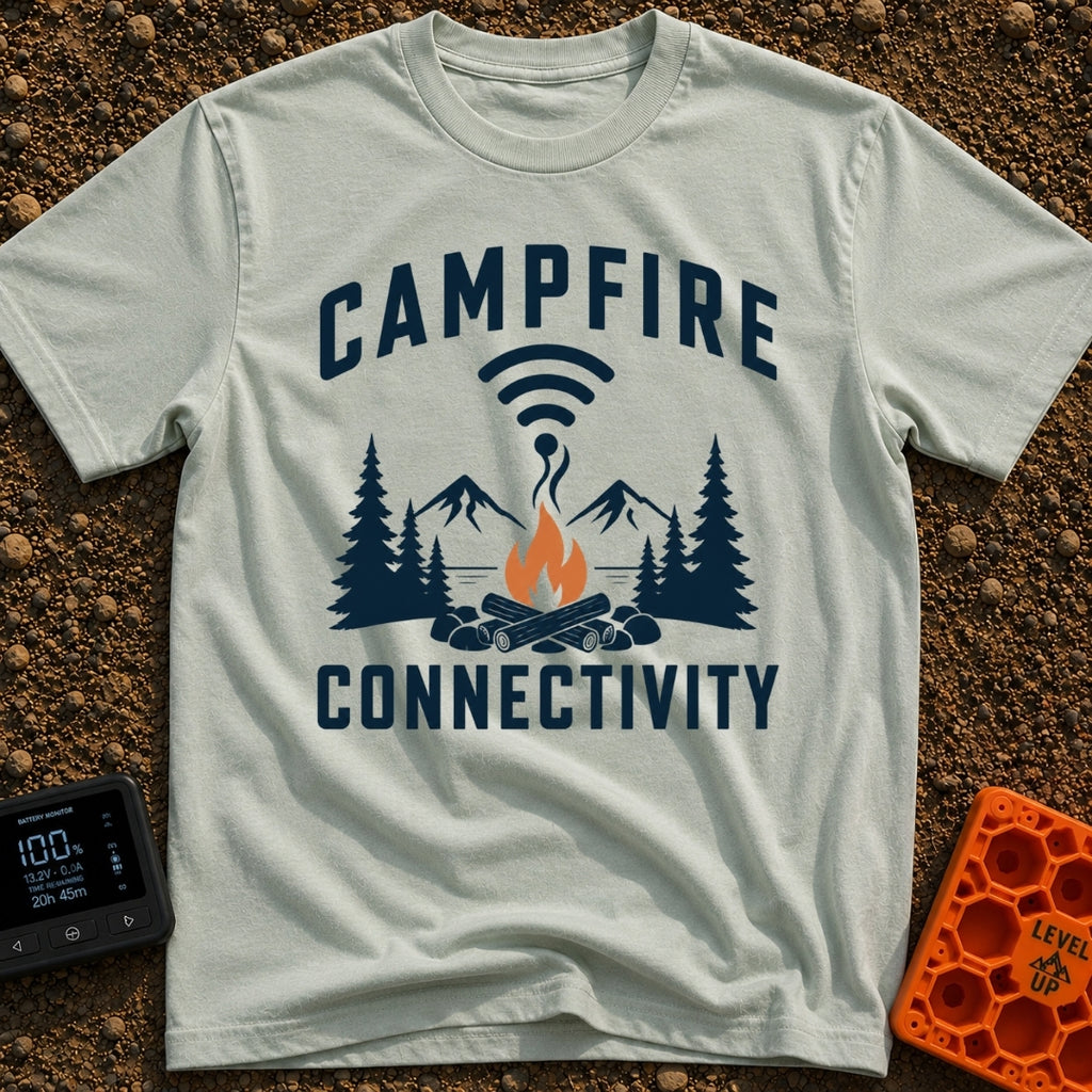 The Original Hot Spot - T-Shirt in Bay - A graphic illustration featuring a campfire in a rock ring with pine trees and...