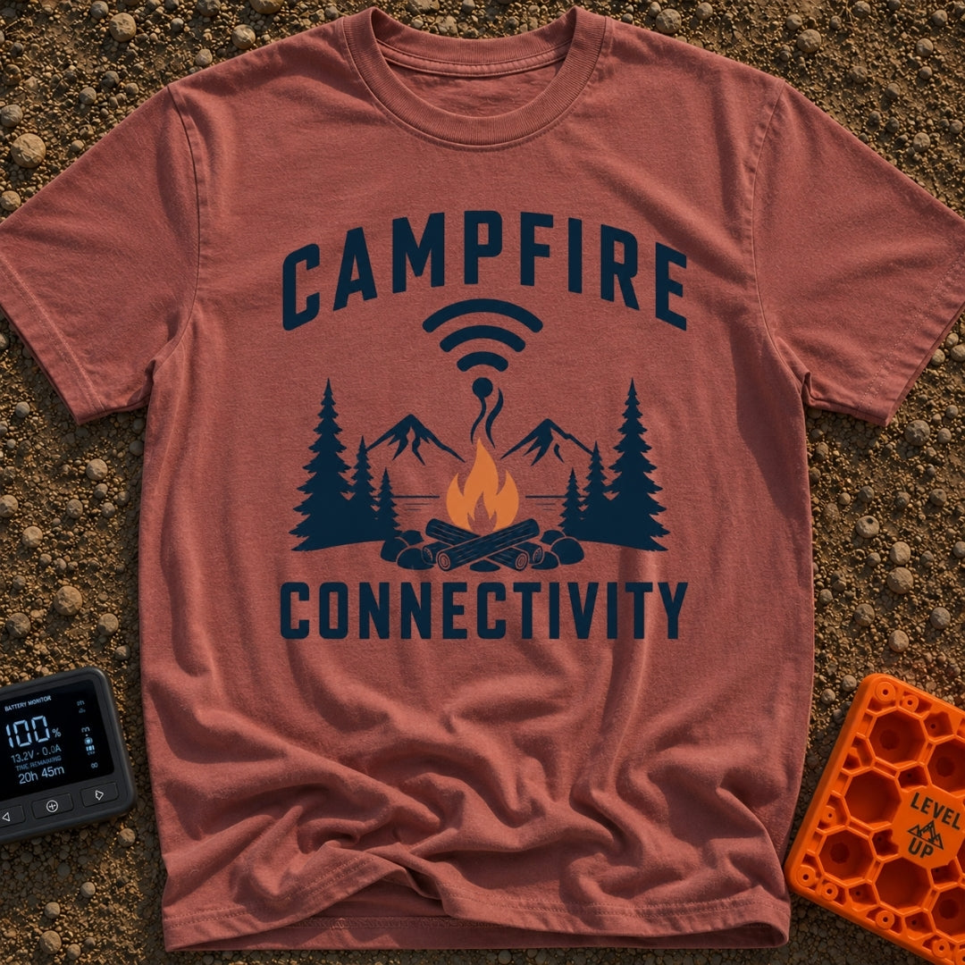 The Original Hot Spot - T-Shirt in Brick - A graphic illustration featuring a campfire in a rock ring with pine trees and...