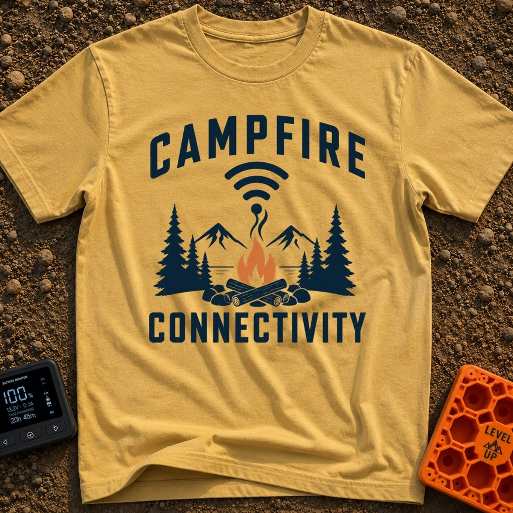 The Original Hot Spot - T-Shirt in Mustard - A graphic illustration featuring a campfire in a rock ring with pine trees...