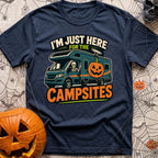 Unexplained Campfire Attendance - T-Shirt in Navy - A skeleton throws a peace sign from the driver's window of a blue...