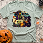 Unexplainable Campfire Attendance - T-Shirt in Bay - A cartoon illustration of a ghost, witch, skeleton, and vampire...