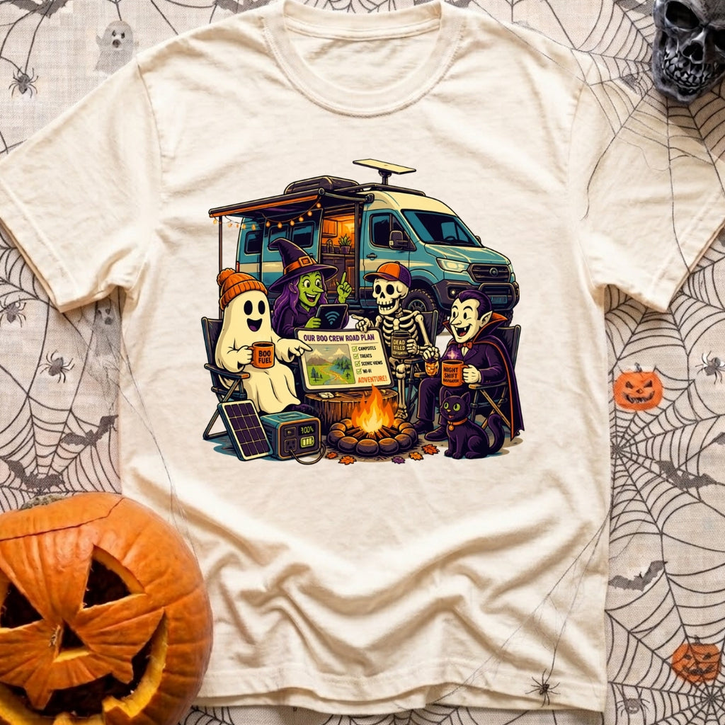 Unexplainable Campfire Attendance - T-Shirt in Ivory - A cartoon illustration of a ghost, witch, skeleton, and vampire...
