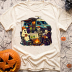 Unexplainable Campfire Attendance - T-Shirt in Ivory - A cartoon illustration of a ghost, witch, skeleton, and vampire...