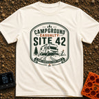 Campground Crash Site - T-Shirt in Ivory - A graphic badge design featuring a Class C motorhome stuck in muddy tire ruts...