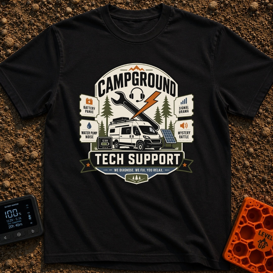 Campground Help Desk - T-Shirt in Black - A graphic badge featuring a white camper van parked among pine trees with a...
