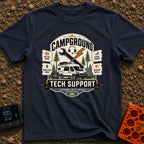 Campground Help Desk - T-Shirt in Navy - A graphic badge featuring a white camper van parked among pine trees with a...