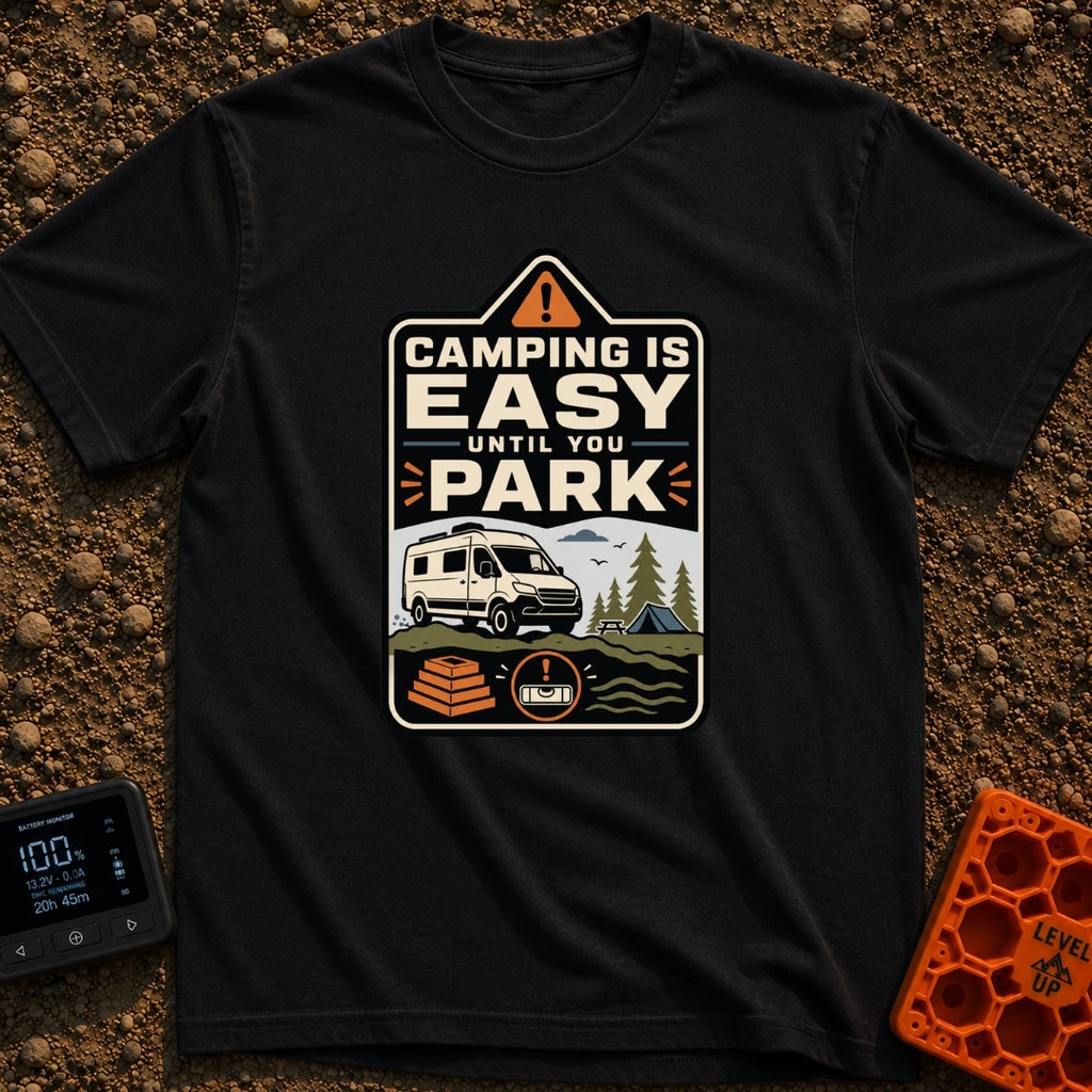 Easy Until You Park - T-Shirt in Black - A badge-style illustration showing a white campervan parked on uneven ground...