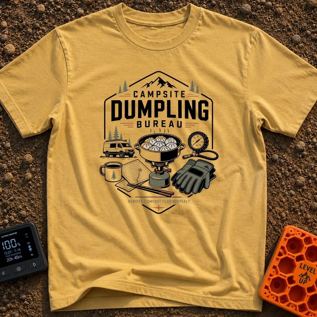 Campsite Dumpling Bureau - T-Shirt in Mustard - A badge-style illustration showing a camper van in the woods next to a...