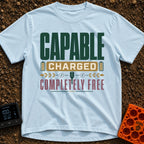Charged To Roam Free - T-Shirt in Chambray - A typographic design featuring the words "CAPABLE CHARGED COMPLETELY FREE"...