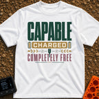Charged To Roam Free - T-Shirt in White - A typographic design featuring the words "CAPABLE CHARGED COMPLETELY FREE"...