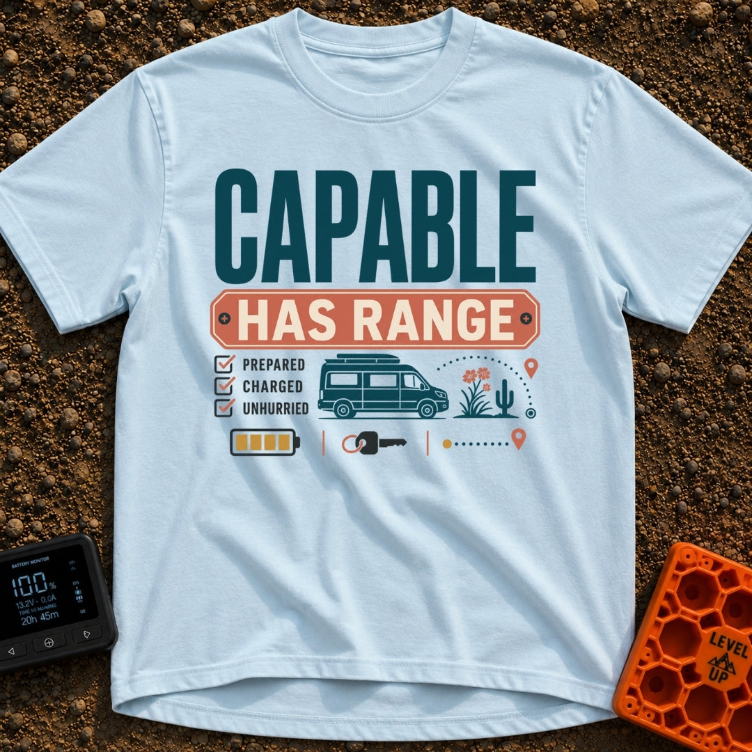 Charged And Capable - T-Shirt in Chambray - Typographical design reading "CAPABLE HAS RANGE" above a checklist featuring...