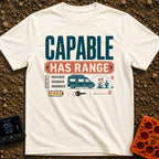 Charged And Capable - T-Shirt in Ivory - Typographical design reading "CAPABLE HAS RANGE" above a checklist featuring the...