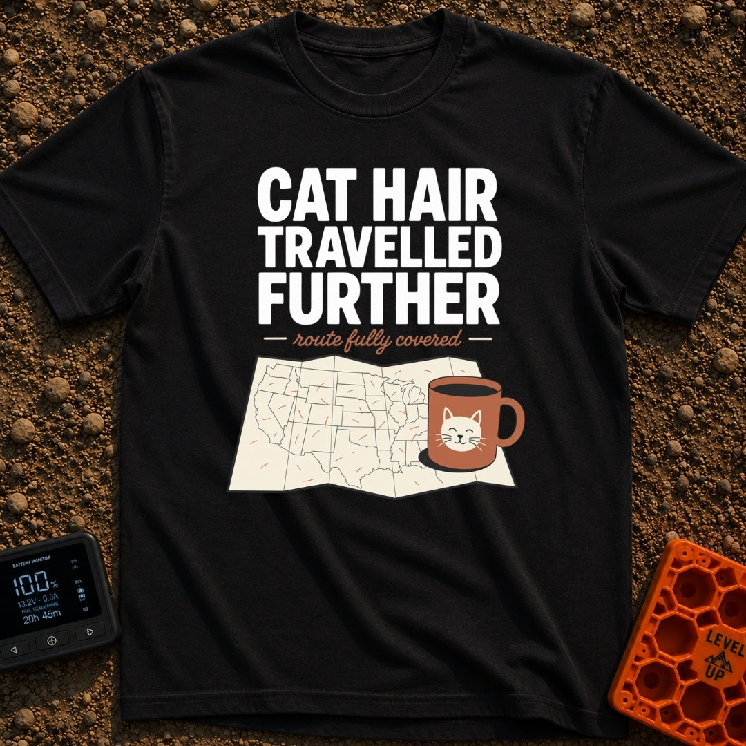 Cat Hair Travelled Further - T-Shirt in Black - A folded map of the United States covered in scattered orange cat hairs,...