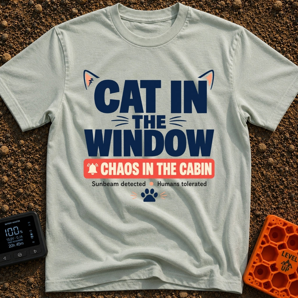 Chaos In The Cabin - T-Shirt in Bay - A typographic design featuring the text "CAT IN THE WINDOW" with stylized cat ears...