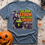 Watts In The Cauldron - T-Shirt in Blue Jean - A cartoon witch with purple hair stirs a bubbling green cauldron that is...