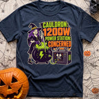 Watts In The Cauldron - T-Shirt in Navy - A cartoon witch with purple hair stirs a bubbling green cauldron that is...
