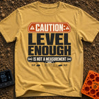 That Looks Level Enough - T-Shirt in Mustard - A text-based design featuring an orange warning banner reading "CAUTION:",...