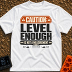 That Looks Level Enough - T-Shirt in White - A text-based design featuring an orange warning banner reading "CAUTION:",...
