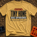 Tiny Home Big Opinions - T-Shirt in Mustard - A graphic styled like a warning label featuring the text "CAUTION: TINY...
