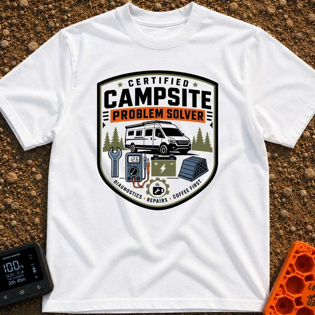Campsite Crisis Wrangler - T-Shirt in White - A badge-style illustration of a white camper van parked among pine trees,...